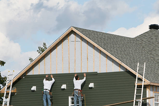 Professional Siding technician working in Melrose Park, IL